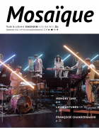 Couverture du magazine montrant une photo d'un concert, musiciens habillés en blanc sur une scène, avec des faisceaux lumineux